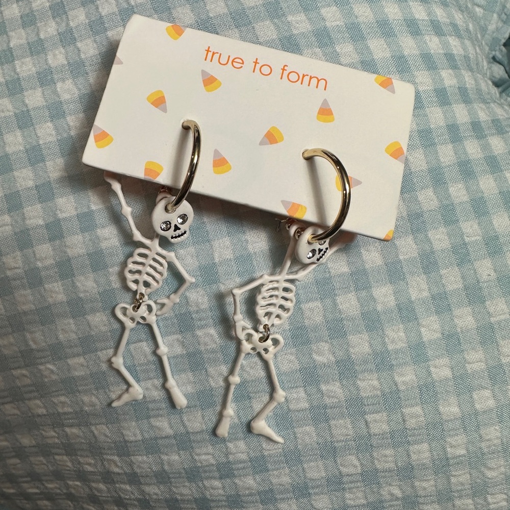 True to Form White Skeleton Earrings